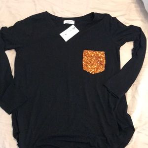 Women’s Black long sleeve shirt with copper sequin pocket